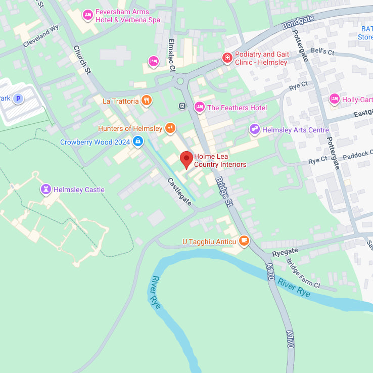 A map showing the location of Holme Lea Country Interiors with a red pin marker, surrounded by nearby landmarks, roads, and green land areas.